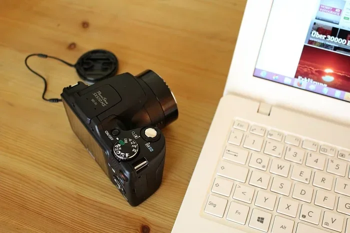 How Can I Take a Picture Using the Camera in My Laptop